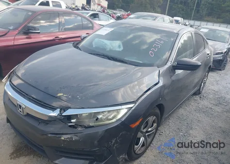 2018 Honda Civic Lx z USA, uszkodzony, nr VIN 19XFC2F54JE023161